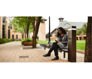 young woman sitting outside